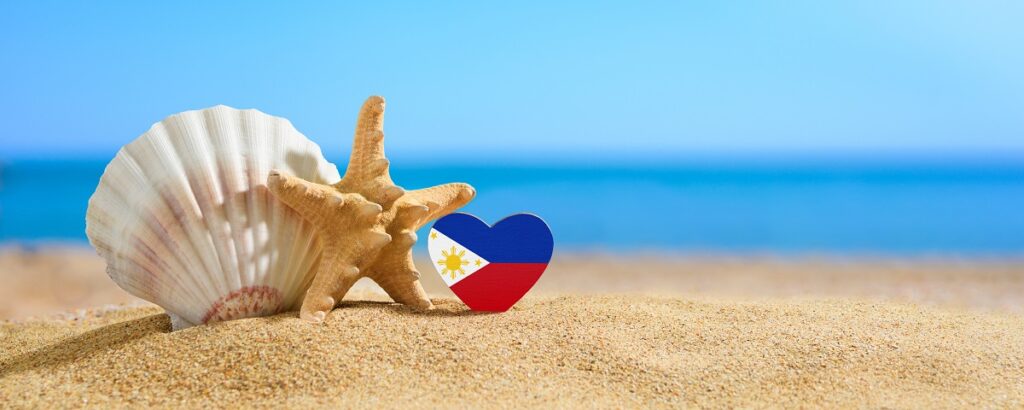 Beautiful Philippines beach. Philippines flag in the shape of a